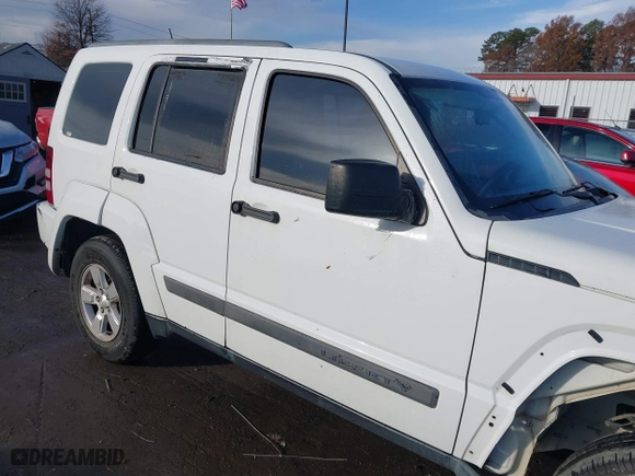 2011 Jeep Liberty Sport with VIN 1J4PP2GK7BW586705, listed as a IAAI auction lot 41110560 with 202,848 mi miles. Bid and sale history available at carsss.com. Image 13.