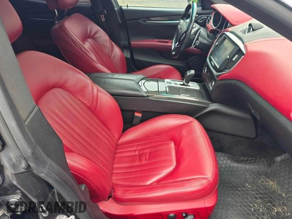 2014 Maserati Ghibli S Q4 z VIN ZAM57RTA7E1089301, wystawiony jako Copart lot #54070585 z przebiegiem 59 787 mil mil oraz Szkoda całkowita • Salvage title. Historia ofert i sprzedaży dostępna na DreamBid. Obrazek 5.
