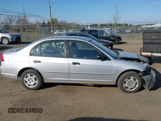 2001 Honda Civic LX with VIN 1HGES16541L057120, listed as a IAAI auction lot 41897827 with 160,715 mi miles. Bid and sale history available at carsss.com. Image 13.