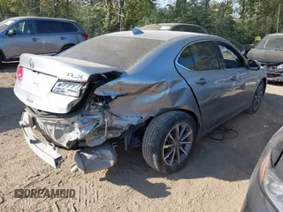 2019 Acura TLX with VIN 19UUB1F3XKA009385, listed as a IAAI auction lot 40584274 with 61,376 mi miles. Bid and sale history available at carsss.com. Image 4.