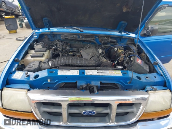 1999 Ford Ranger XLT z VIN 1FTZR15X5XTA79599, wystawiony jako IAAI lot #42109669 z przebiegiem 184 836 mil mil oraz . Historia ofert i sprzedaży dostępna na DreamBid. Obrazek 10.