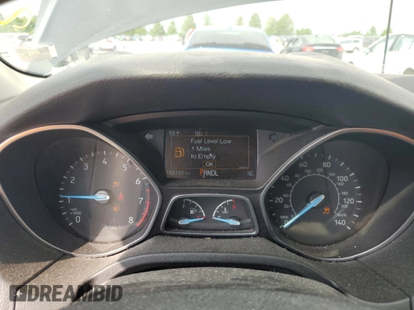 2016 Ford Focus SE z VIN 1FADP3F20GL281772, wystawiony jako Copart lot #59544365 z przebiegiem 166 189 mil mil oraz Czysty tytuł • Clean title. Historia ofert i sprzedaży dostępna na DreamBid. Obrazek 9.