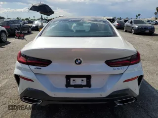2023 BMW 8 Series 840i with VIN WBAGV4C01PCL65666, listed as a Copart auction lot 47543754 with 31,703 mi miles. Bid and sale history available at carsss.com. Image 6.