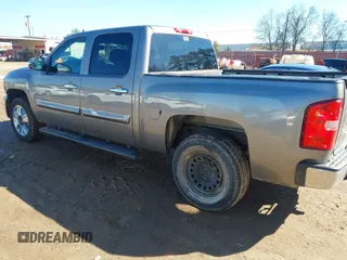 2013 Chevrolet Silverado 1500 LT with VIN 3GCPCSE06DG233909, listed as a IAAI auction lot 41601589 with 328,365 mi miles and . Bid and sale history available at DreamBid. Image 3.