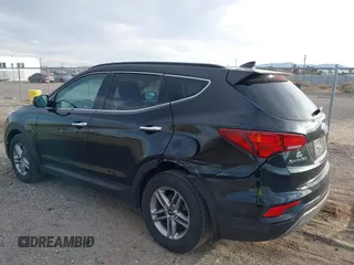 2017 Hyundai Santa Fe 2.4L z VIN 5XYZU3LB5HG425830, wystawiony jako IAAI lot #41428863 z przebiegiem 76 366 mil mil oraz . Historia ofert i sprzedaży dostępna na DreamBid. Obrazek 3.