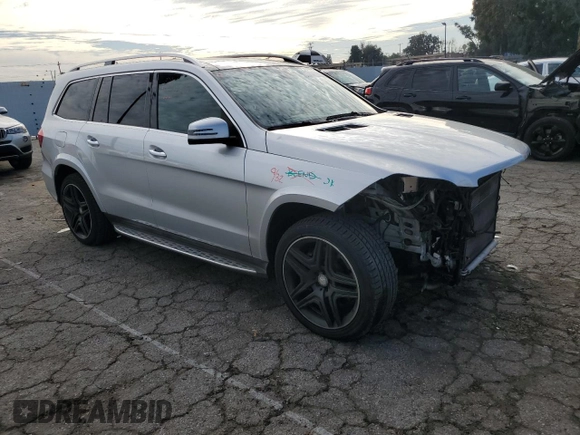 2015 Mercedes-Benz GL-Class GL 550 with VIN 4JGDF7DE7FA455957, listed as a Copart auction lot 39546504 with 132,568 mi miles. Bid and sale history available at carsss.com. Image 4.