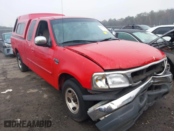 1999 Ford F-150 z VIN 1FTRX17WXXNA90516, wystawiony jako IAAI lot #41787426 z przebiegiem 354 066 mil mil oraz . Historia ofert i sprzedaży dostępna na DreamBid. Obrazek 13.