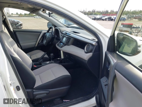 2018 Toyota RAV4 XLE with VIN JTMWFREV7JJ174483, listed as a IAAI auction lot 41597797 with 82,836 mi miles. Bid and sale history available at carsss.com. Image 5.