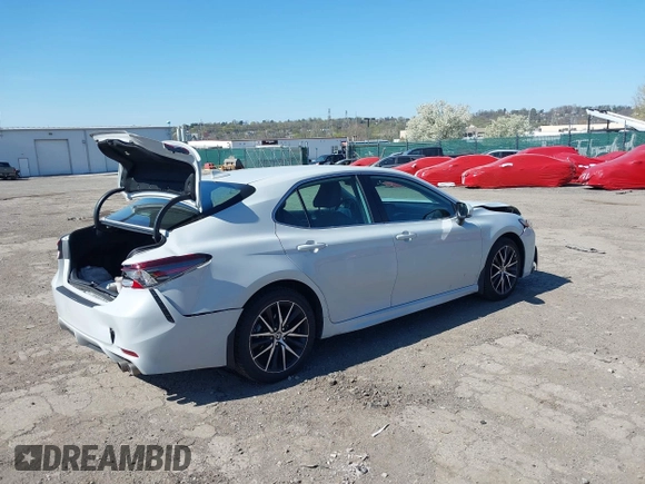 2023 Toyota Camry SE z VIN 4T1T11BK4PU102236, wystawiony jako IAAI lot #42001524 z przebiegiem 50 818 mil mil oraz . Historia ofert i sprzedaży dostępna na DreamBid. Obrazek 4.