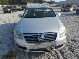 2009 Volkswagen Passat Sedan Komfort with VIN WVWJK73CX9P009421, listed as a Copart auction lot 70830104 with 224,356 mi miles and Salvage Title. Bid and sale history available at carsss.com. Image 5.