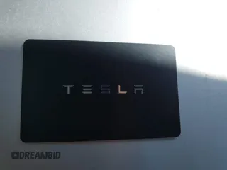 2021 Tesla Model 3 Performance with VIN 5YJ3E1EC5MF050598, listed as a IAAI auction lot 41778169 with 74,710 mi miles and . Bid and sale history available at carsss.com. Image 11.