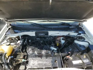 2002 Mazda Tribute LX with VIN 4F2YU09132KM10219, listed as a Copart auction lot 70619724 with 202,687 mi miles and Salvage Title. Bid and sale history available at carsss.com. Image 12.