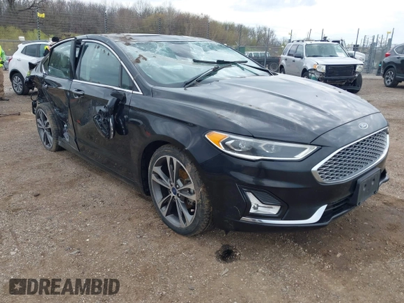 2020 Ford Fusion Titanium with VIN 3FA6P0D9XLR174523, listed as a IAAI auction lot 42100113 with 100,602 mi miles and . Bid and sale history available at DreamBid. Image 1.