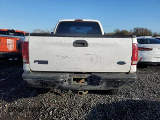 2003 Ford F-350 XL with VIN 1FTSX31P63EB62658, listed as a Copart auction lot 84054284 with 227,705 mi miles and Salvage Title. Bid and sale history available at DreamBid. Image 6.