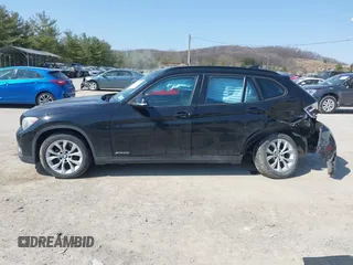 2013 BMW X1 xDrive28i with VIN WBAVL1C59DVR87469, listed as a IAAI auction lot 41775333 with 124,220 mi miles. Bid and sale history available at carsss.com. Image 14.