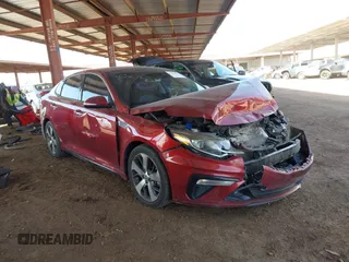2019 Kia Optima LX with VIN 5XXGT4L31KG310064, listed as a IAAI auction lot 41703047 with 177,590 mi miles. Bid and sale history available at carsss.com. Image 1.