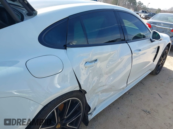 2018 Porsche Panamera 4 E-Hybrid z VIN WP0AE2A73JL129993, wystawiony jako IAAI lot #41602216 z przebiegiem 53 426 mil mil oraz . Historia ofert i sprzedaży dostępna na DreamBid. Obrazek 6.