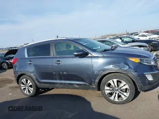 2012 Kia Sportage EX with VIN KNDPCCA22C7325011, listed as a IAAI auction lot 42046727 with 131,475 mi miles and . Bid and sale history available at DreamBid. Image 13.
