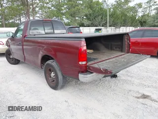 1999 Ford F-150 with VIN 2FTZF1722XCA69178, listed as a IAAI auction lot 42313254 with 197,589 mi miles and . Bid and sale history available at DreamBid. Image 3.