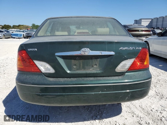2001 Toyota Avalon XL with VIN 4T1BF28B21U116895, listed as a Copart auction lot 48507255 with 211,361 mi miles and Salvage Title. Bid and sale history available at DreamBid. Image 6.