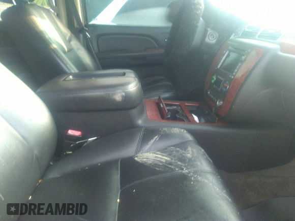 2008 Chevrolet Tahoe LTZ with VIN 1GNFK13028J123429, listed as a IAAI auction lot 42415046 with 240,925 mi miles and . Bid and sale history available at DreamBid. Image 5.