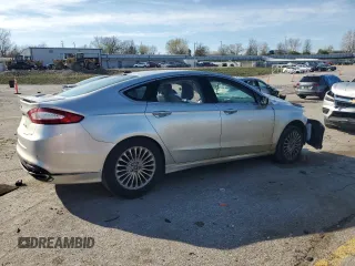 2014 Ford Fusion Titanium with VIN 3FA6P0K90ER228580, listed as a Copart auction lot 49986585 with Not Provided miles and Salvage Title. Bid and sale history available at DreamBid. Image 3.