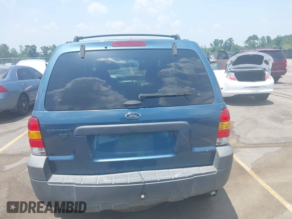 2006 Ford Escape XLT z VIN 1FMCU93156KB10612, wystawiony jako IAAI lot #42583417 z przebiegiem 133 615 mil mil oraz . Historia ofert i sprzedaży dostępna na DreamBid. Obrazek 16.