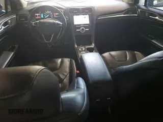 2018 Ford Fusion Titanium с VIN 3FA6P0D90JR159218, выставлен на аукционе Copart как лот 63766945 с пробегом 115 529 миль миль и Списание • Salvage title. История ставок и продаж доступна на DreamBid. Изображение 8.