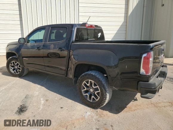 2021 GMC Canyon 4WD AT4 w/Cloth with VIN 1GTG6FEN1M1295551, listed as a Copart auction lot 74900294 with 39,853 mi miles and Salvage Title. Bid and sale history available at carsss.com. Image 2.