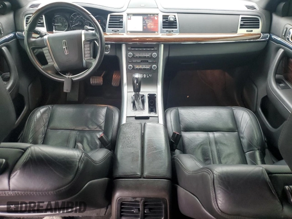 2012 Lincoln MKS with VIN 1LNHL9ER3CG806878, listed as a Copart auction lot 87162644 with 136,878 mi miles and Salvage Title. Bid and sale history available at DreamBid. Image 8.