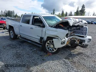 2019 GMC Sierra 2500HD Denali z VIN 1GT12SEY3KF269442, wystawiony jako IAAI lot #42231991 z przebiegiem 75 172 mil mil oraz . Historia ofert i sprzedaży dostępna na DreamBid. Obrazek 1.