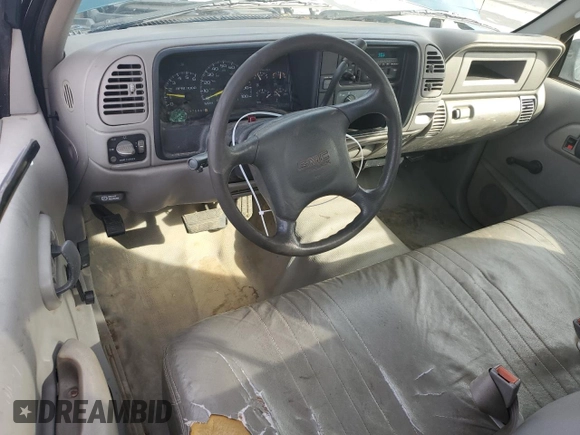 1997 GMC Sierra 1500 with VIN 1GTGC24JXVE524979, listed as a Copart auction lot 79087634 with 170,567 mi miles and Salvage Title. Bid and sale history available at DreamBid. Image 8.
