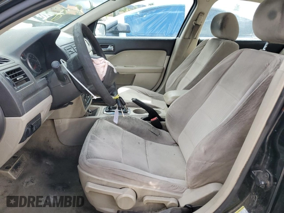 2006 Ford Fusion S with VIN 3FAFP06Z36R195389, listed as a Copart auction lot 46903095 with 127,284 mi miles and Salvage Title. Bid and sale history available at DreamBid. Image 7.