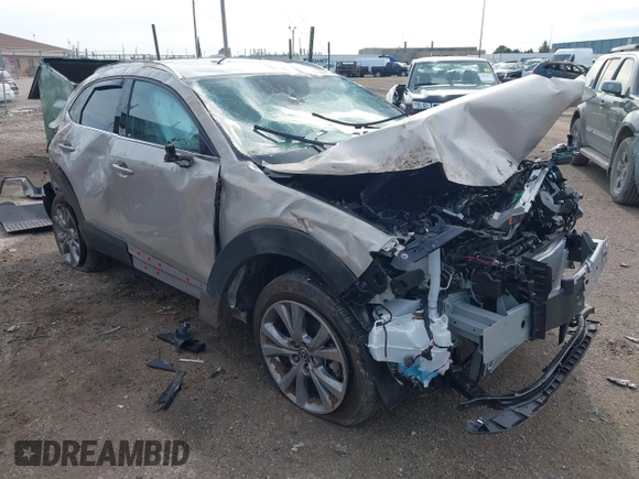 2023 Mazda CX-30 S Premium with VIN 3MVDMBDMXPM563500, listed as a IAAI auction lot 42092423 with 9,148 mi miles and . Bid and sale history available at DreamBid. Image 1.