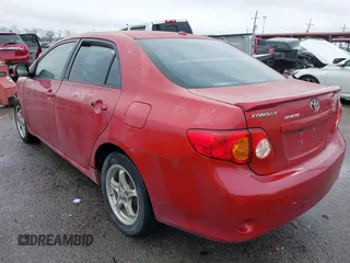 2009 Toyota Corolla with VIN 1NXBU40E09Z099663, listed as a IAAI auction lot 41069276 with 187,726 mi miles. Bid and sale history available at carsss.com. Image 3.