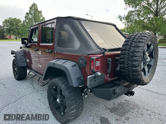2007 Jeep Wrangler Unlimited X with VIN 1J8GA39147L156911, listed as a Copart auction lot 65987405 with 115,766 mi miles and Clean title. Bid and sale history available at DreamBid. Image 3.