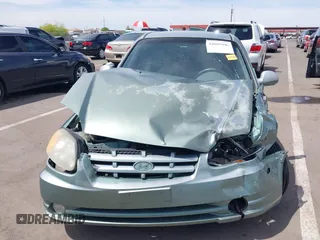 2003 Hyundai Accent GL with VIN KMHCG35C53U277734, listed as a IAAI auction lot 42085996 with 108,369 mi miles. Bid and sale history available at carsss.com. Image 12.