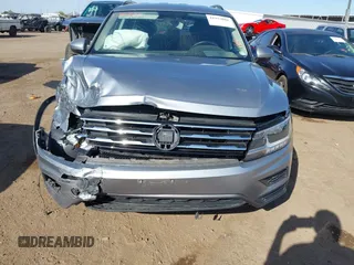 2019 Volkswagen Tiguan SE with VIN 3VV2B7AX1KM170926, listed as a IAAI auction lot 41953801 with 54,361 mi miles and . Bid and sale history available at DreamBid. Image 12.