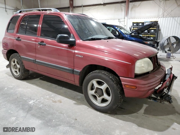 1999 Suzuki Vitara JX with VIN 2S3TD52V4X6110057, listed as a Copart auction lot 87752215 with 245,419 mi miles and Salvage Title. Bid and sale history available at carsss.com. Image 4.