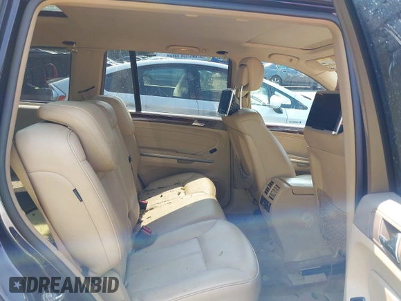 2011 Mercedes-Benz GL-Class GL 450 with VIN 4JGBF7BE8BA627367, listed as a IAAI auction lot 39992230 with 153,606 mi miles. Bid and sale history available at carsss.com. Image 8.