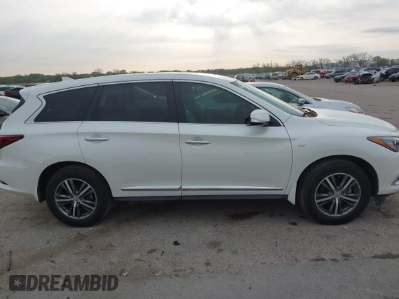 2020 Infiniti QX60 Pure with VIN 5N1DL0MN2LC531102, listed as a IAAI auction lot 41918887 with 55,284 mi miles and . Bid and sale history available at DreamBid. Image 14.