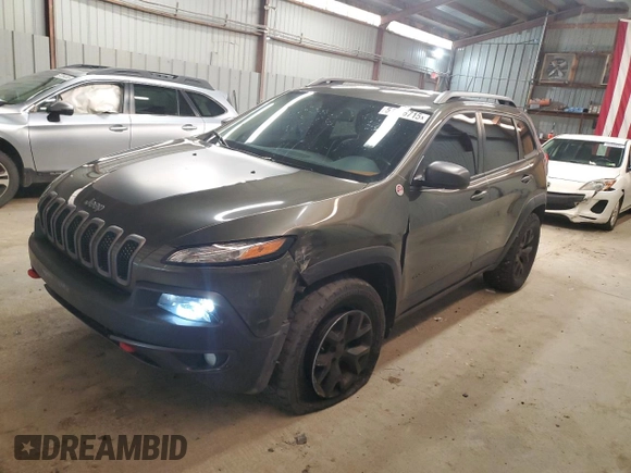 2015 Jeep Cherokee Trailhawk z VIN 1C4PJMBS8FW665607, wystawiony jako Copart lot #51536715 z przebiegiem 166 443 mil mil oraz Szkoda całkowita • Salvage title. Historia ofert i sprzedaży dostępna na DreamBid. Obrazek 1.
