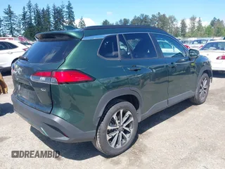2023 Toyota Corolla Cross XLE with VIN 7MUEAAAG6PV052816, listed as a IAAI auction lot 42386639 with 42,736 mi miles and . Bid and sale history available at DreamBid. Image 4.