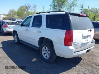 2007 GMC Yukon SLT with VIN 1GKFK13007R319995, listed as a IAAI auction lot 42142010 with 248,723 mi miles. Bid and sale history available at carsss.com. Image 3.