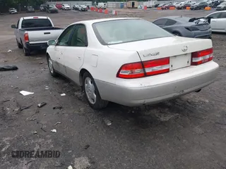 2001 Lexus ES 300 z VIN JT8BF28G410307451, wystawiony jako IAAI lot #42369871 z przebiegiem 290 620 mil mil oraz . Historia ofert i sprzedaży dostępna na DreamBid. Obrazek 3.