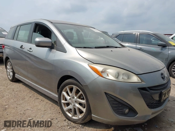 2012 Mazda 5 Grand Touring z VIN JM1CW2DL1C0126545, wystawiony jako IAAI lot #42301130 z przebiegiem 151 212 mil mil oraz . Historia ofert i sprzedaży dostępna na DreamBid. Obrazek 1.