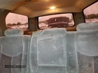 2003 Chevrolet Suburban LS z VIN 3GNEC16Z13G186812, wystawiony jako Copart lot #58567425 z przebiegiem 302 320 mil mil oraz Szkoda całkowita • Salvage title. Historia ofert i sprzedaży dostępna na DreamBid. Obrazek 10.