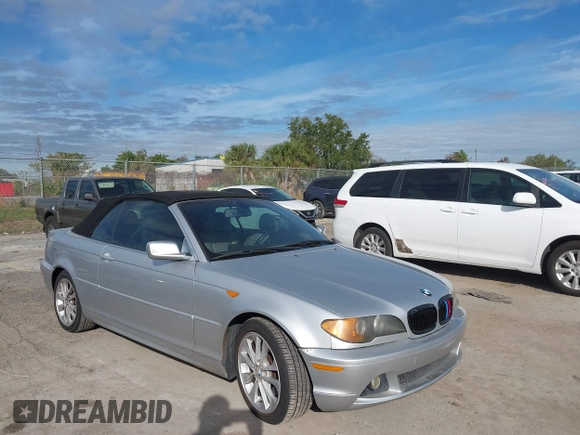 2004 BMW 3 Series 330Ci with VIN WBABW534X4PL45274, listed as a IAAI auction lot 41437124 with 124,001 mi miles. Bid and sale history available at carsss.com. Image 5.