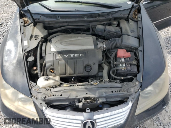 2006 Acura RL z VIN JH4KB16586C010597, wystawiony jako Copart lot #53846535 z przebiegiem 212 219 mil mil oraz Szkoda całkowita • Salvage title. Historia ofert i sprzedaży dostępna na DreamBid. Obrazek 11.