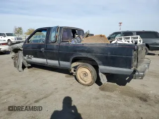 1993 Nissan Hardbody z VIN 1N6HD16SXPC310961, wystawiony jako Copart lot #79261954 z przebiegiem 329 438 mil mil oraz Szkody całkowita. Historia ofert i sprzedaży dostępna na DreamBid. Obrazek 2.